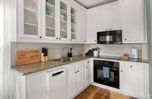 Kessler Apartment | Artsy urban retreat steps from Bishop Arts. Thoughtfully designed with creative touches, a dreamy coffee station, and a king bed you won't want to leave. Gated parking and a responsive host. Repeat guests say it's even more beautiful in person.