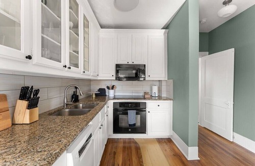 Kessler Apartment | Artsy urban retreat steps from Bishop Arts. Thoughtfully designed with creative touches, a dreamy coffee station, and a king bed you won't want to leave. Gated parking and a responsive host. Repeat guests say it's even more beautiful in person.