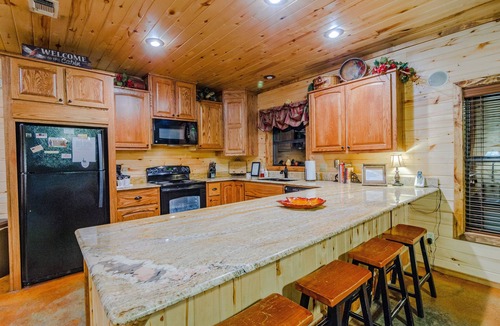 Broken Bow Cabin | At Last, you can enjoy life with all the comforts of your own home on your stres
