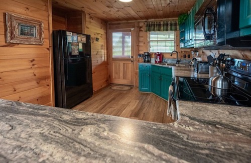 Smoky Mountains Cabin | Awestruck: Free Attraction Tickets, Hot Tub, Pool Access, Perfect Mountain Views, & Fireplace
