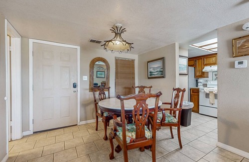South Padre Island Condo | Bay-view all-suite condo with pool & fishing dock - walk to beach