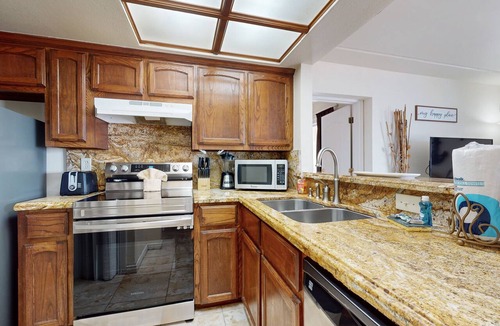 South Padre Island Condo | Bayfront condo close to beach with water views & pool access