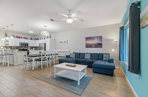 Port Isabel House | Bayfront Home with Shared Pool, Dock, Balcony, Playground and Washer/Dryer