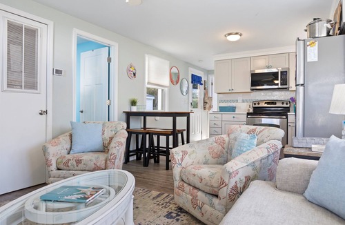 Surf City House | Beach bungalow |Fenced yard |Steps to toes in sand