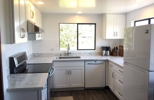 Clinton Cottage | Beach house with views of Puget Sound, ferry, North Cascades, Mt Baker, Rainier.