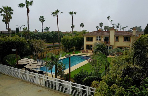 Huntington Beach House | Beach Living 15,000sf Resort Property 5 min walk to beach.