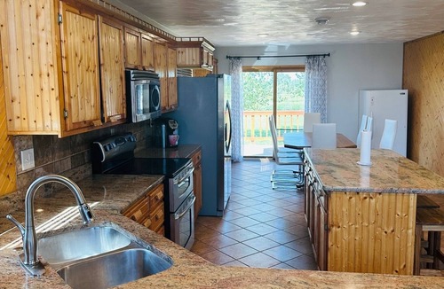Aberdeen Cabin | Beautiful A-frame log home-spacious living/dining room-ideal for special events.