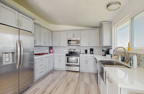 Spanish Grant House | Beautiful dog-friendly home w deck & ocean view - enclosed yard, steps to sand