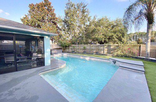 Titusville House | Beautiful heated pool home with office in Florida