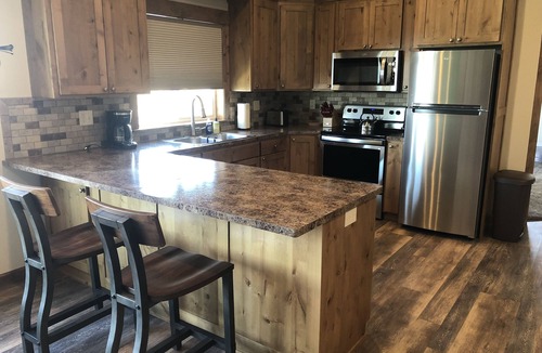 Ashton Apartment | Beautiful loft apartment overlooking the Henry’s Fork River at the Ora Bridge!