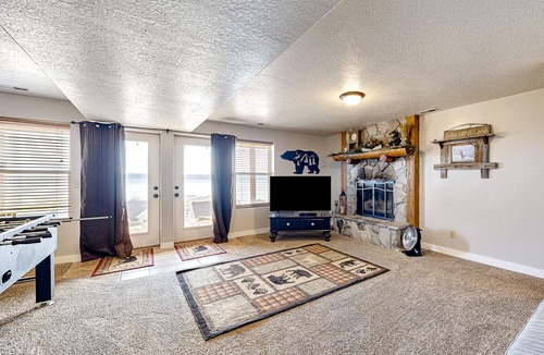 Harbor Village Cabin | Beautiful log cabin with lake views, wraparound deck, & foosball