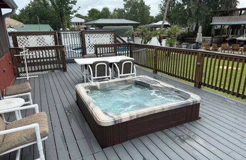 Astor Cottage | Beautiful Water Front Astor Cottage w Pool, Hot tub, Huge Deck & Wifi