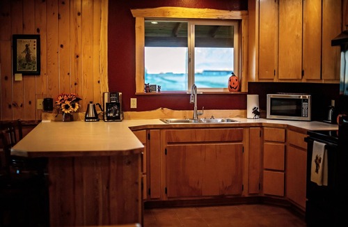 St. Ignatius Cabin | Bison Range 15 minutes away! Cozy Cabin w/Beautiful Creek & Mtn Views!