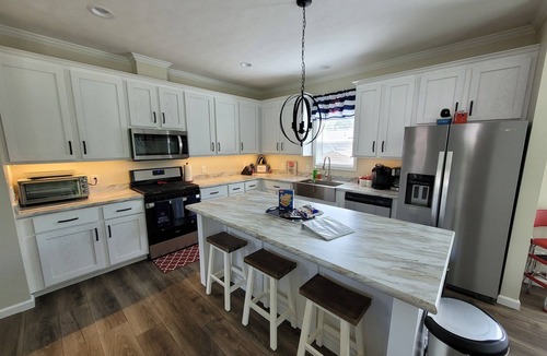 Lake Milton House | Brand new lake front house with private dock. Come visit the Loon's Nest