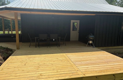 Dennis Cabin | Cabin near Bay Springs Lake! Enjoy the outdoors with convenience of WiFi.