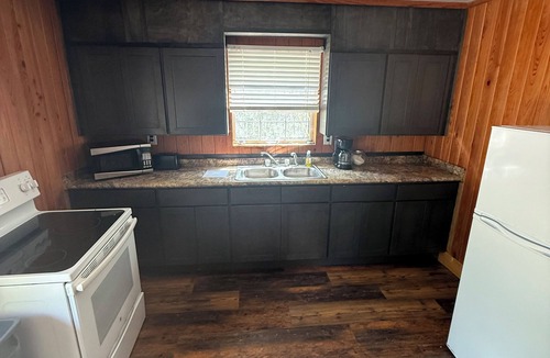 Perkinston Cabin | Camp House on Red Creek - Uncle Ralph’s Cabin Rentals - PRIVATE BEACH