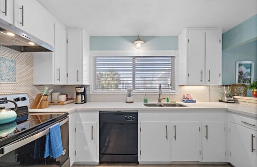 Jamaica Beach House | Canal Front Home with Private Pool & Boat Slip
