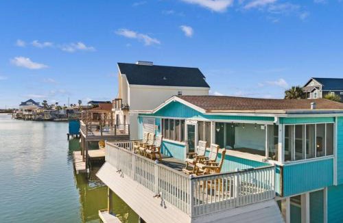 Jamaica Beach House | Canal front home with boat slip, deck and gorgeous water views