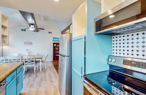 Spanish Grant House | Canal view retreat with vaulted ceilings & three-story observation deck
