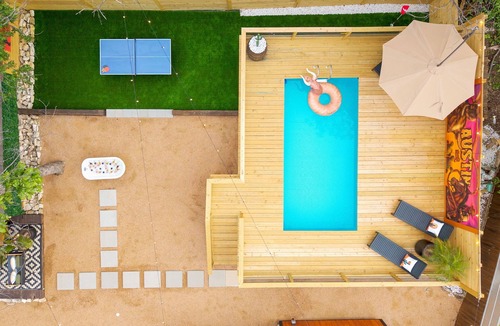 South Manchaca House | Casa Bahia - Pool, Western Bar, HUGE Resort Backyard, Sleeps 17 across 3 units!
