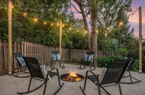 West Omaha House | Central Family Oasis with Hot Tub & Fenced Yard