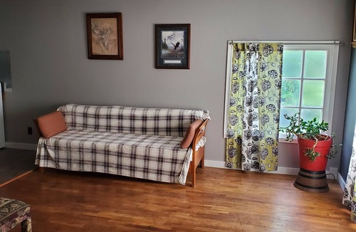 Buffalo Apartment | Charming 1-bedroom apt Buffalo WY, on creek, AC, WiFi, & 1 block from downtown.