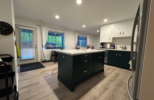 BX House | Charming 2-bedroom walk-out basement in tranquil Coldstream with swim spa