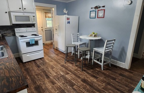 Kannapolis House | Charming 2BR-3bed home with WiFi wooden rockers on porch in wonderful Kannapolis