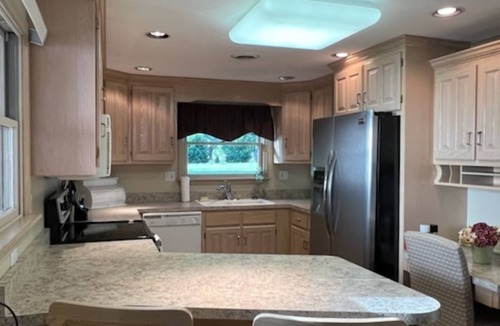 Greenville House | Charming 3-bedroom house in tranquil Greenville with WiFi, AC, and game room.