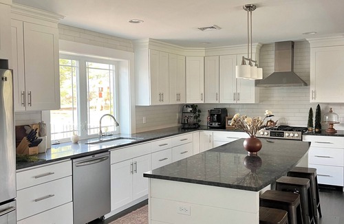 Suplee House | Charming 3-bedroom house with fenced in dog yard and playground and hottube