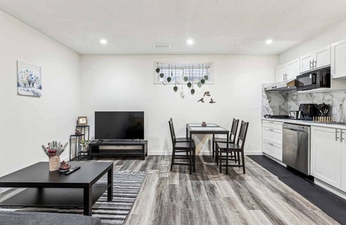 Cranston Cottage | Charming Basement Suite With Parking & Laundry