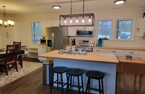 Chester House | Charming brick home set in the woods on 45 acres with pond and trails.