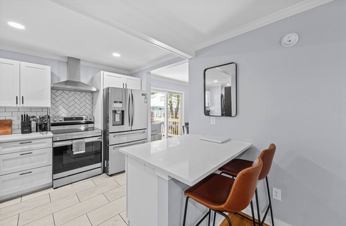 Downtown House | Charming Downtown Corner Cottage - 1 Block Walk to Food & Fun - Dog Friendly!