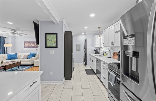 Downtown House | Charming Downtown Corner Cottage - 1 Block Walk to Food & Fun - Dog Friendly!