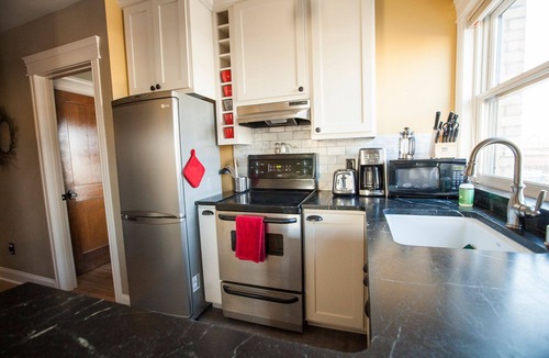 Riverfront Condo | Charming & Historic Babs Condo- On Hip Strip & Walking Distance to Downtown!