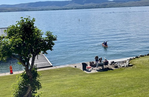 Polson Cabin | Charming rustic cabin with shared lake access and golf course views.