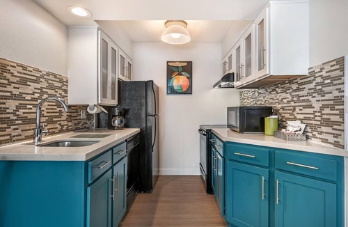 Florida Central Atlantic Coast Hotel | Close to SeaWorld Orlando! TWO 2BR Suites with Kitchens, Pool, Pets Allowed!
