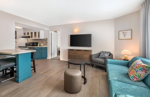 Florida Central Atlantic Coast Hotel | Close to SeaWorld Orlando! TWO 2BR Suites with Kitchens, Pool, Pets Allowed!