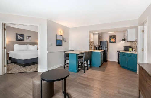 Florida Central Atlantic Coast Hotel | Close to SeaWorld Orlando! TWO 2BR Suites with Kitchens, Pool, Pets Allowed!
