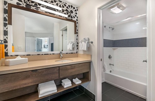 Florida Central Atlantic Coast Hotel | Close to SeaWorld Orlando! TWO 2BR Suites with Kitchens, Pool, Pets Allowed!