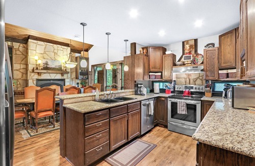 Gruene House | Clutter Falls Retreat with Two Homes, Hot Tubs & Guadalupe River Views