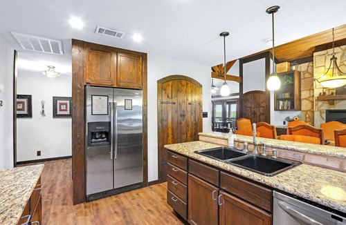 Gruene House | Clutter Falls Retreat with Two Homes, Hot Tubs & Guadalupe River Views