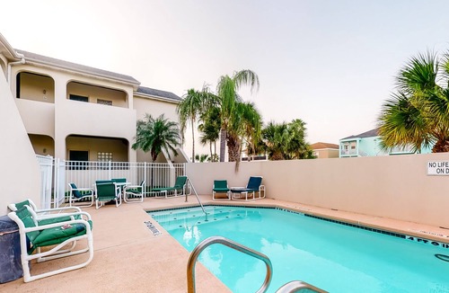 South Padre Island Condo | Coastal Condo with Private Patio, Gas Grill, Shared Pool, & Free WiFi