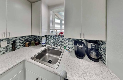 Leeward Sands House | Coastal Hideaway | Cozy + Pet-Friendly Retreat