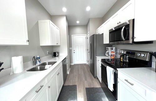 Cedar Falls House | Comfort & Space: 3 King Beds, Large Rooms, Attached Garage!