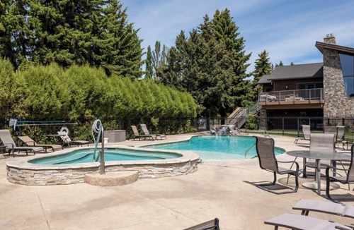 Bigfork Condo | Condo w/fireplace, private patio, A/C - One of a Kind Marina Cay Estates Condo