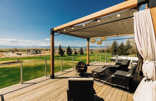 Sheridan House | Contemporary Wyoming Luxury- Midcentury Modern, mountain views & rooftop deck
