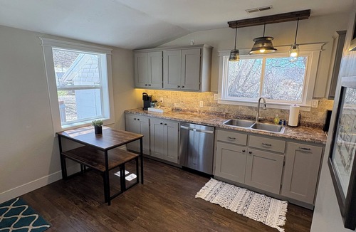 St. Anthony House | Country living house 5 min to sand dunes with large patio, hot tub, and fire pit