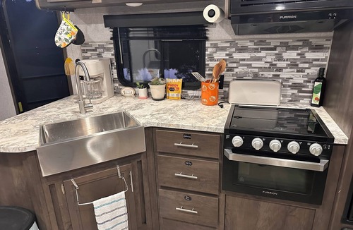 Greenville House | Cozy 1-bedroom RV on private stocked pond. Glamping in Greenville