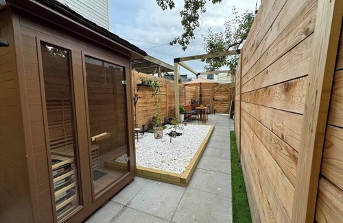 H Street Corridor House | Cozy 2-bedroom Townhome in Washington D.C with Sauna, Cold Plunge + Workout area